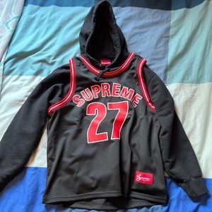A black and red Supreme basketball jersey hooded sweatshirt